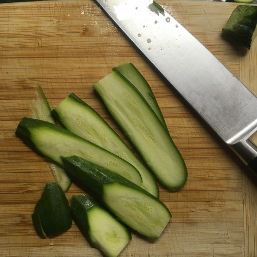 Sliced zucchini on a cutting board